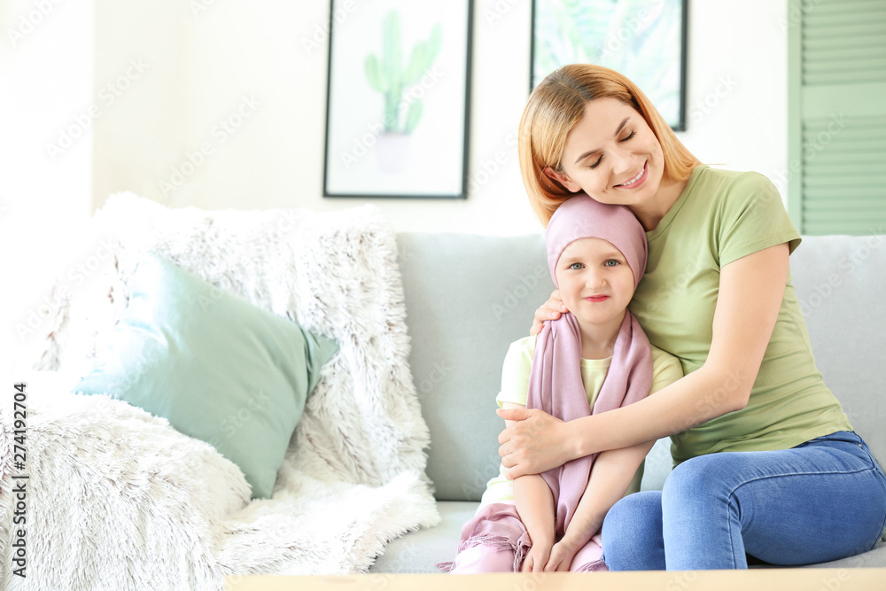 Little girl after chemotherapy with her mother at home Little girl after chemotherapy with her mother at home