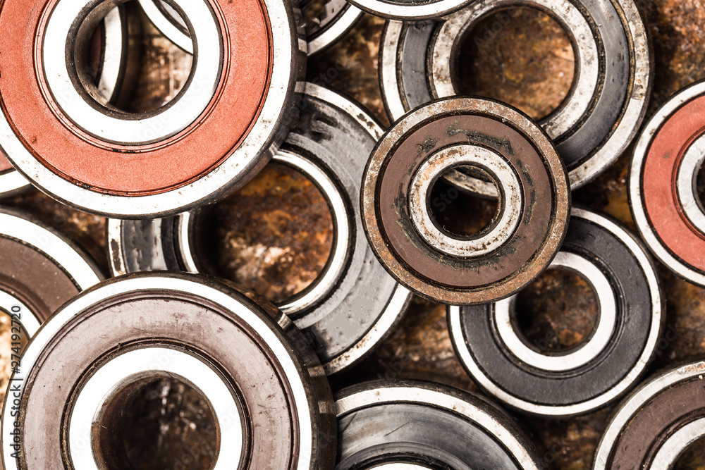 Various car parts and accessories, on metal background - Image Various car parts and accessories, on metal background - Image