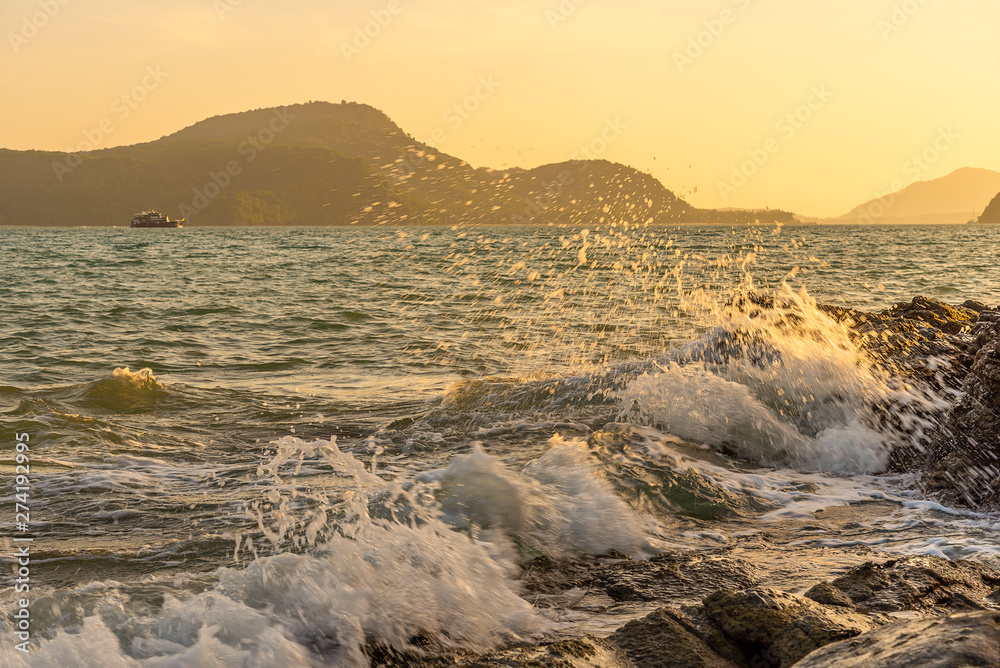 Sea sunset or sunrise with water splash