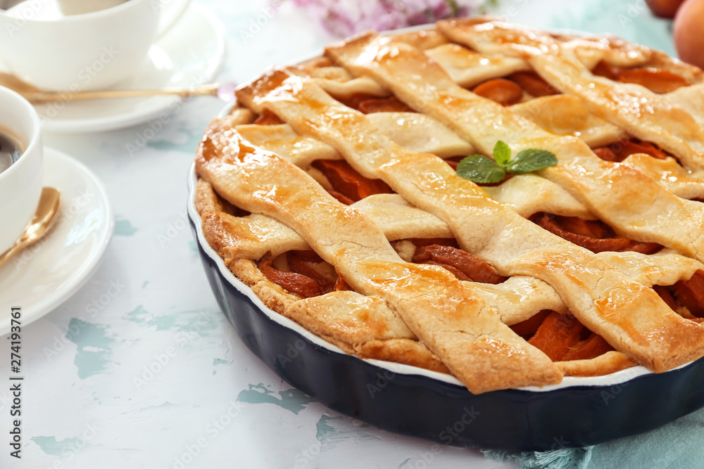 Tasty peach pie on table, closeup Tasty peach pie on table, closeup