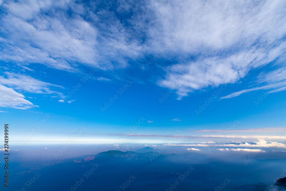 The sea of clouds under the blue sky and white clouds, Emei mountain, Sichuan province, China The sea of clouds under the blue sky and white clouds, Emei mountain, Sichuan province, China