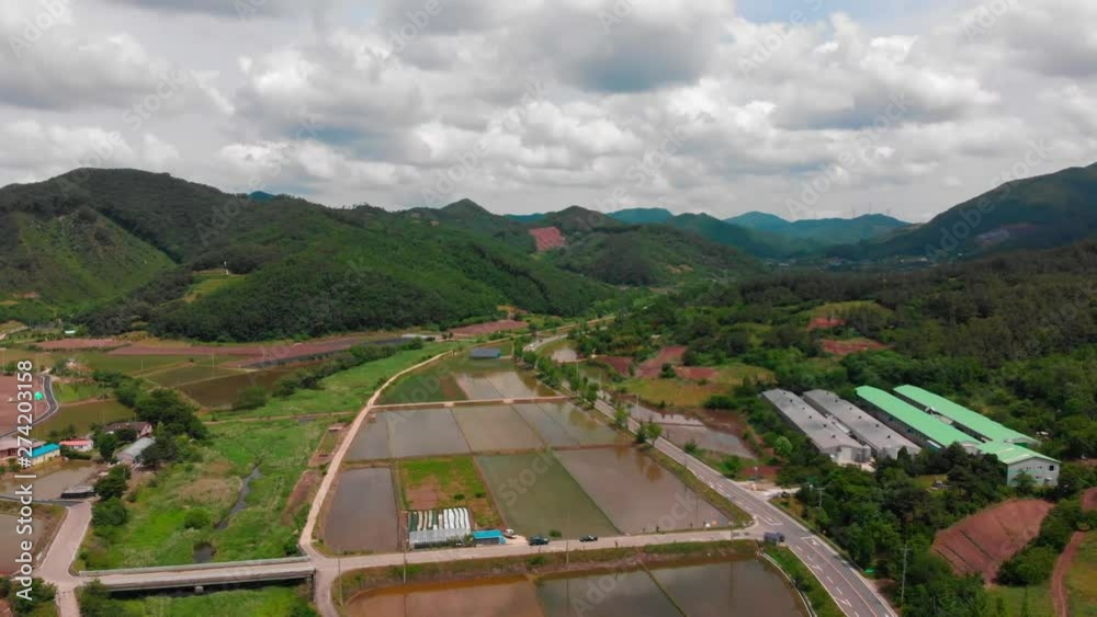 High altitude aerial landscape view and road tracking in country side High altitude aerial landscape view and road tracking in country side