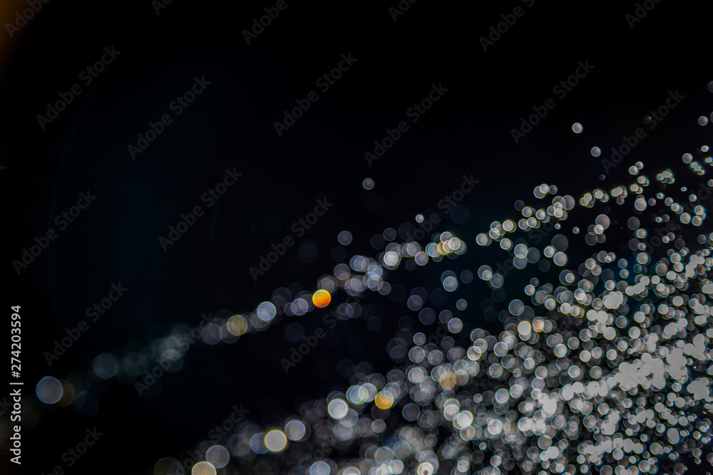 Colorful blur bokeh defocused on black Colorful blur bokeh defocused on black