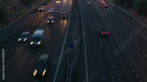 Timelapse of a beautiful sunset in Madrid, Spain. M-23 highway and Pirulí tower (Torrespaña) as main subject. photo