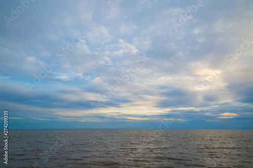 water and blue sky before sunset