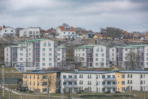 Picture of colored suburban apartment building. Scandinavian style