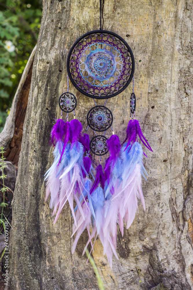 Handmade dream catcher with feathers threads and beads rope hanging