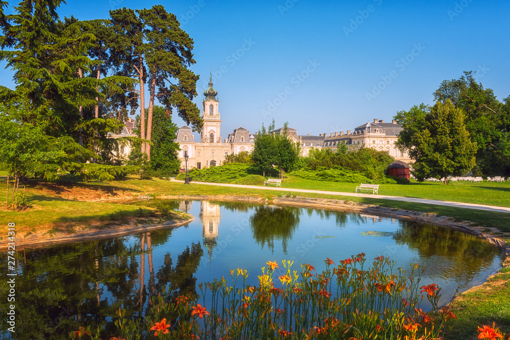 Fototapeta premium Festetics Palace with beautiful garden in summer, baroque architecture, Keszthely, Zala, Hungary. Outdoor travel background