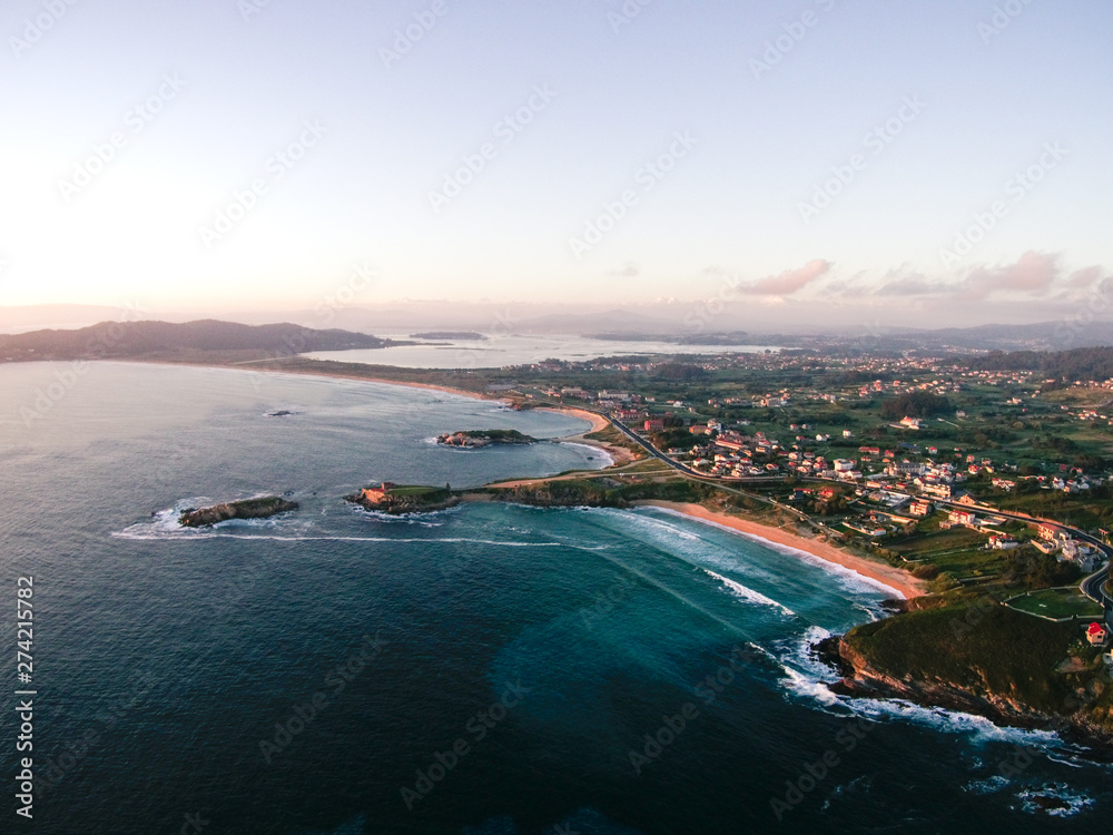 aerial view of the coastline at sunset in Galicia, Spain