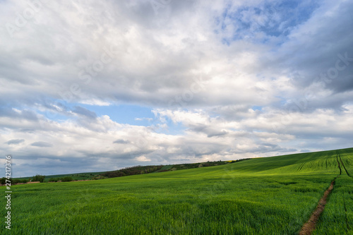 Scenic view of beautiful country landscape. Clouds passing above rural fields in South Moravia  Czech Republic.