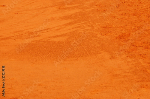 Texture close-up of clay tennis court photo