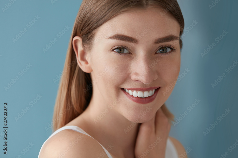 Beauty portrait of smiling woman with white teeth smile Beauty portrait of smiling woman with white teeth smile