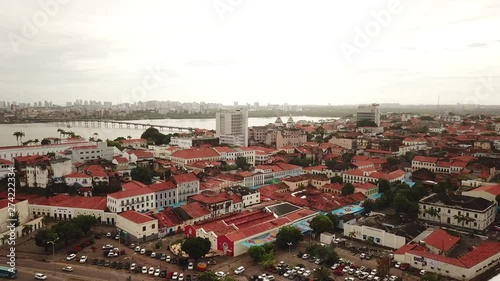 Aerial view Market of Tulhas and historical buildings decorated by the government with flags of sao joao in the center of the city of sao luis do maranhao, brazil.