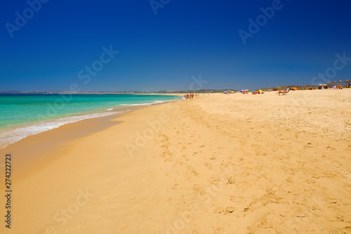 ALVOR, PORTUGAL -  MAI 26, 2019: View on the beach Alvor Poente in Algarve, Portugal.