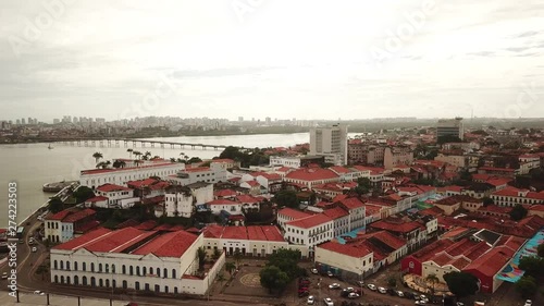 Aerial view Market of Tulhas and historical buildings decorated by the government with flags of sao joao in the center of the city of sao luis do maranhao, brazil.