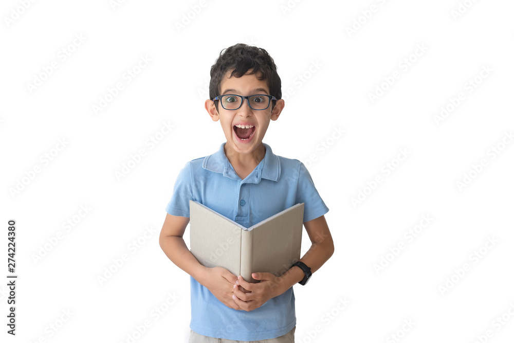 Happy boy in spectacles and polo with book. Isolated over white background. Schoolboy. Teenager. Happy boy in spectacles and polo with book. Isolated over white background. Schoolboy. Teenager.