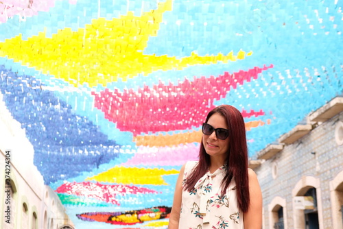 Girl around Flags in the streets of são luis do maranhao for the festival of sao joao, bumba meu boi.