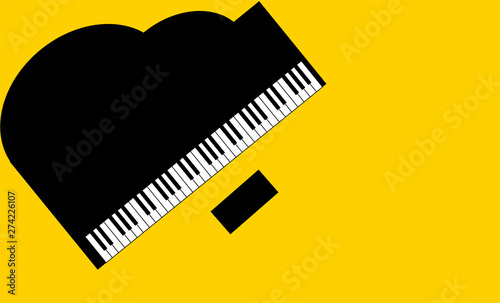 Photographie Top view of Black piano on  yellow background