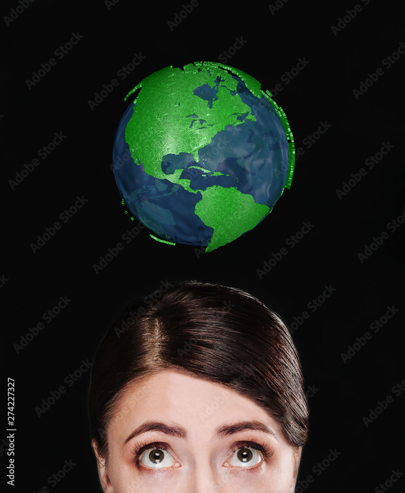 The girl is looking upward in surprise The girl is looking upward in surprise