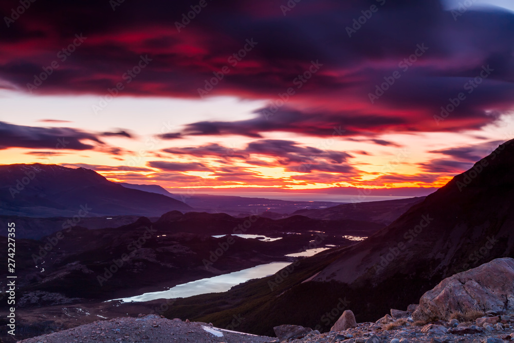Beautiful mountain scenery on the background of colorful sunset.