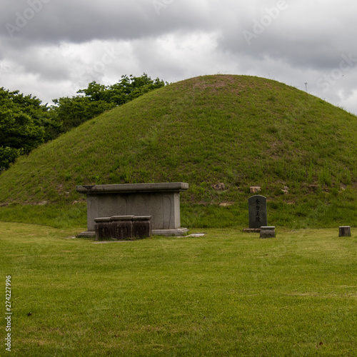 Detail view on Monument and the Cheonmachong Tomb hill. Gyeongju, South Korea, Asia. photo