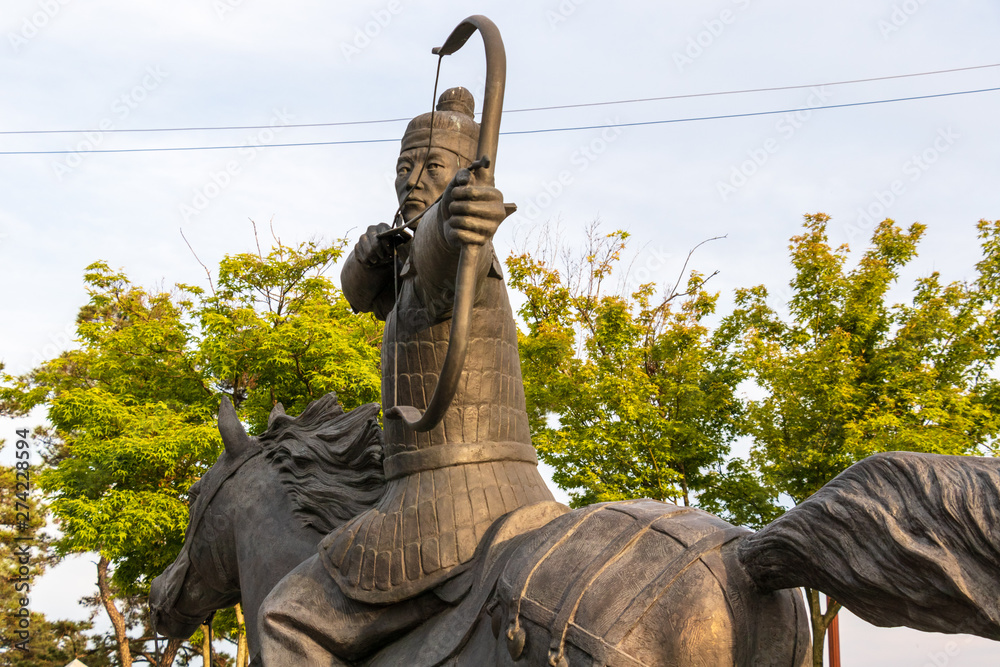 Naklejka premium Details of Monument of King Gyeongdeok sitting on his horse and fighting with the bow. Geumseong-myeon, Uiseong County, South Korea, Asia.