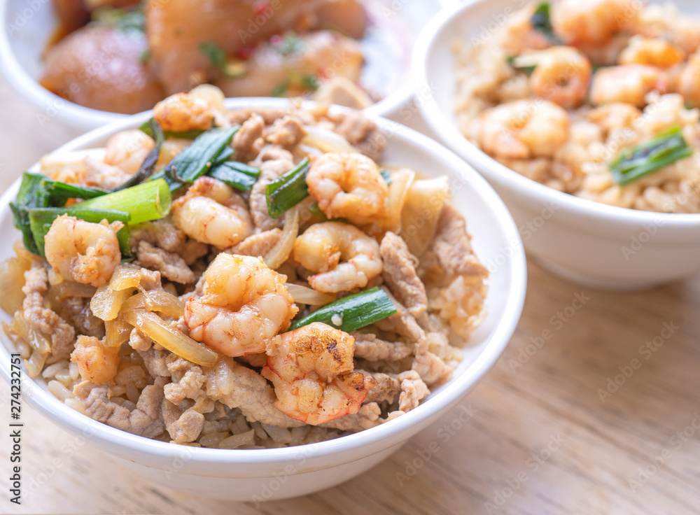 Braised shrimp over rice - Taiwan famous traditional street food. Soy-stewed prawn on cooked rice. Travel concept, top view, copy space, close up Braised shrimp over rice - Taiwan famous traditional street food. Soy-stewed prawn on cooked rice. Travel concept, top view, copy space, close up