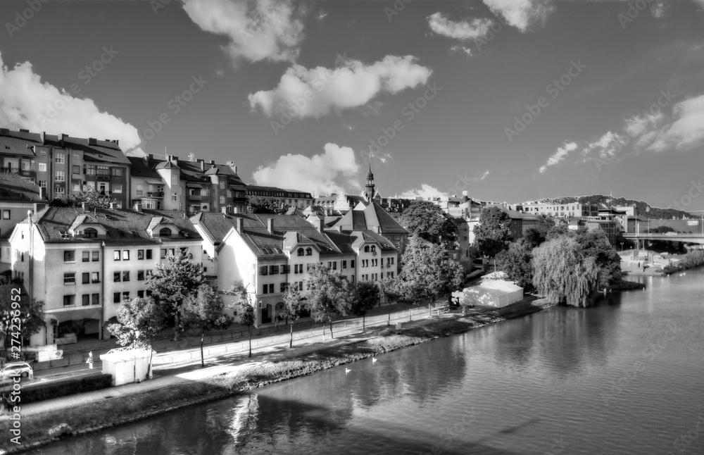 Maribor, Slovenia: Panorama of Maribor city, Slovenia. Drava River, buildings and mountains of Maribor. Black & white.