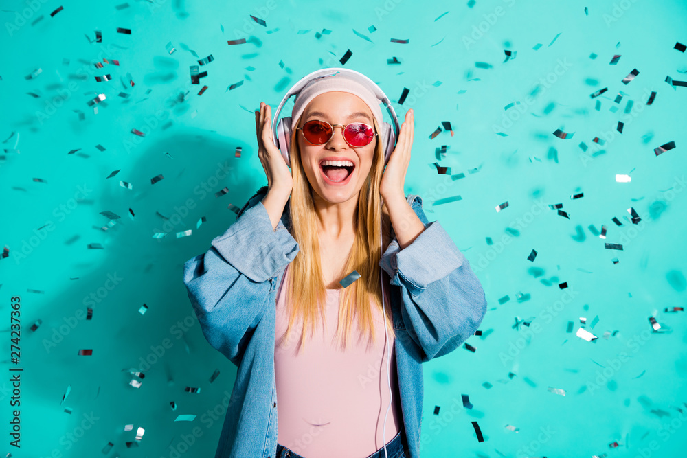 Portrait of nice charming attractive cheerful glad excited girl wearing sun eyeglasses eyewear sound audio soul jazz pop hit cool song isolated on bright vivid shine blue green turquoise background - obrazy, fototapety, plakaty 