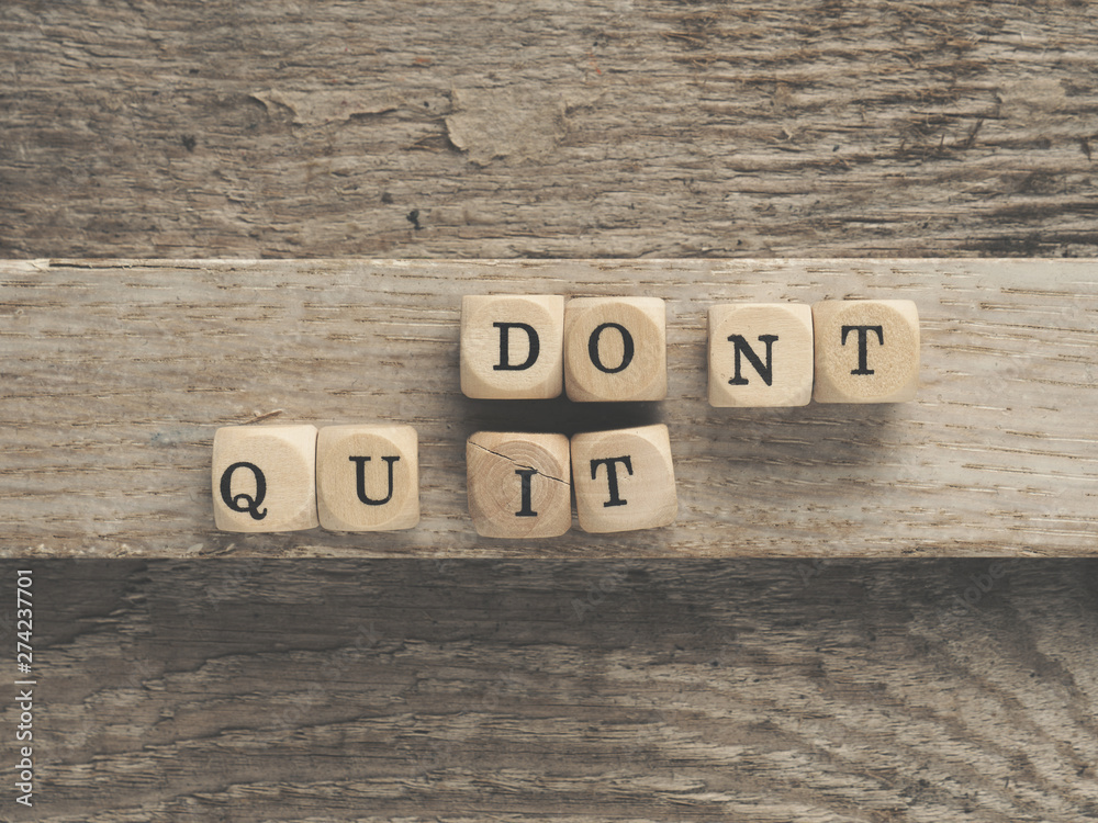Naklejka premium Dont quit do it on wooden blocks
