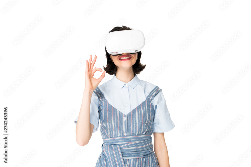 girl with VR headset showing Ok sign at camera isolated on white girl with VR headset showing Ok sign at camera isolated on white
