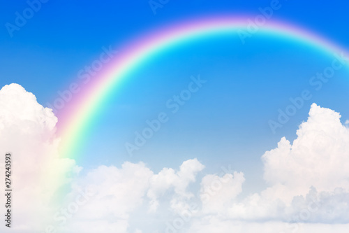 Blue sky and white cloud and rainbow.