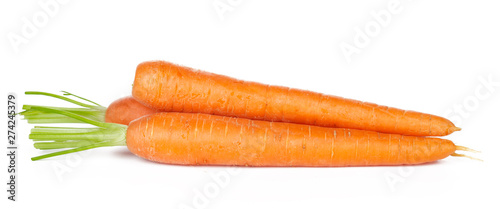 Isolated carrots. Heap of fresh carrots with stems isolated on white background