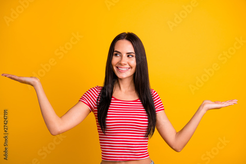Portrait of nice pretty youth person have advise ads advertise look attention demonstrated dressed modern clothing isolated colorful yellow background