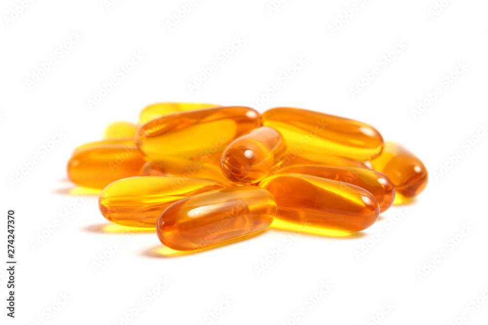 Omega-3 capsules on a white background. Fish oil, healthy supplements Omega-3 capsules on a white background. Fish oil, healthy supplements