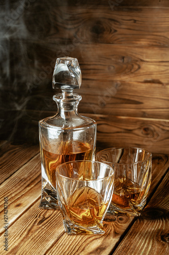 glasses with cognac, whiskey stand on the bar