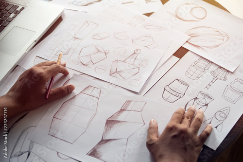 Production designer sketching Drawing Development Design product packaging prototype idea Creative Concept photo