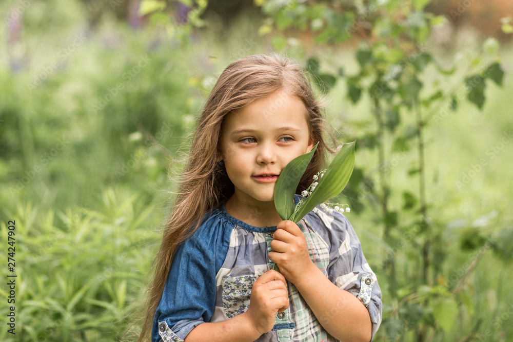 girl with lily of the valley in nature girl with lily of the valley in nature