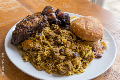 Jamaican curry goat, jerk chicken and fried dumpling