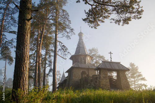 Religious building of a tea house on a foggy morning at dawn near Nikolsky Skete, Valaam Island, Karelia, Russia.