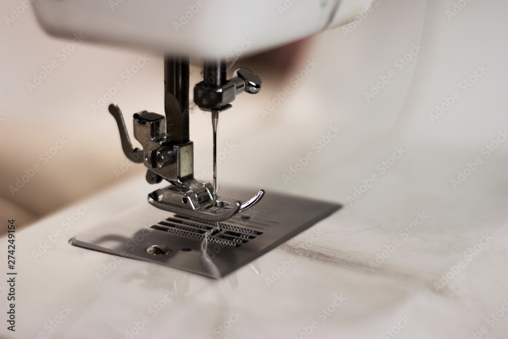 sewing machine details white macro