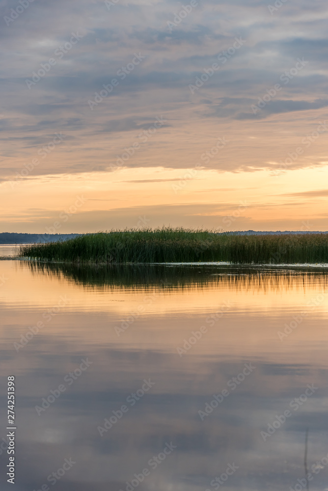 A Still Lake in Rural Latvia at Sunset A Still Lake in Rural Latvia at Sunset