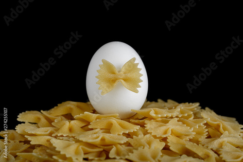 Pasta bows on a black background