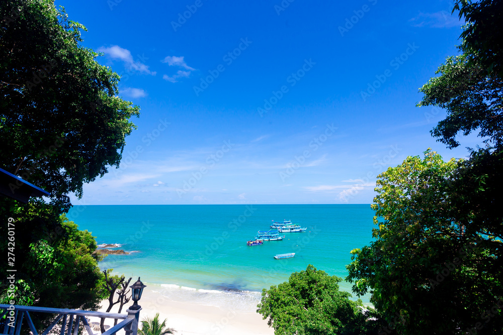 The blue sea with blue sky and clouds ,tropical beach background as summer landscape with sea swing wood beautiful sea view