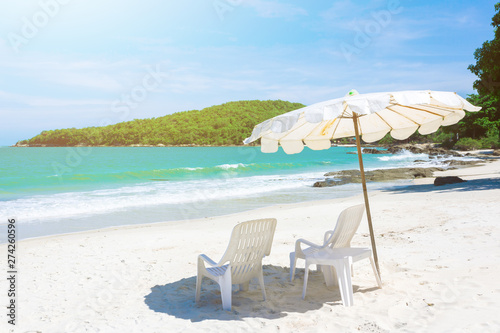 The blue sea with blue sky and clouds  tropical beach background as summer landscape with beach chairs and beautiful sea view