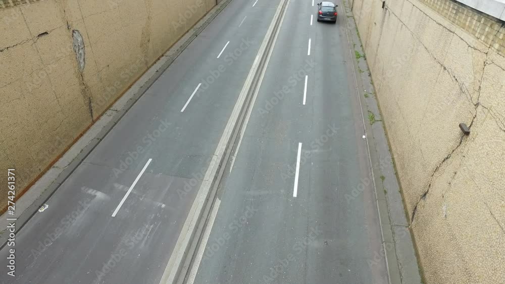 Vehicle traffic from underground tunnel near Congress Palace (Palais des congres) and Hyatt Regency in Paris