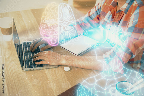 AR hologram with man working on computer on background. Augmented reality concept. Double exposure.