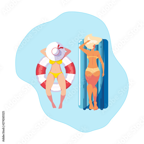 girls with swimsuit in lifeguard and mattress floats in water