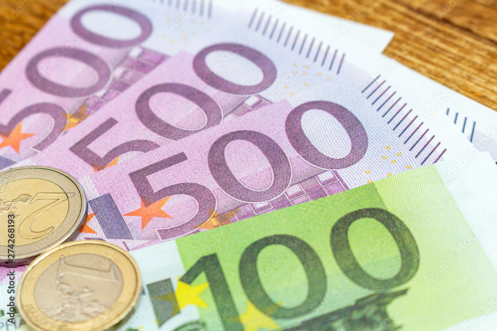 Pack of euro banknotes and coins background finance economy currency close up selective focus Europe currency Pack of euro banknotes and coins background finance economy currency close up selective focus Europe currency