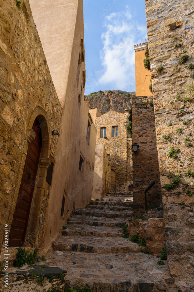 Stone alley inside old town of Monemvasia, Greece